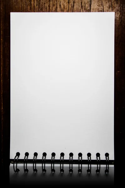 Blank white paper on wooden background.Still life photography — Stock Photo, Image