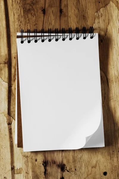 Sketchbook against wood background — Stock Photo, Image