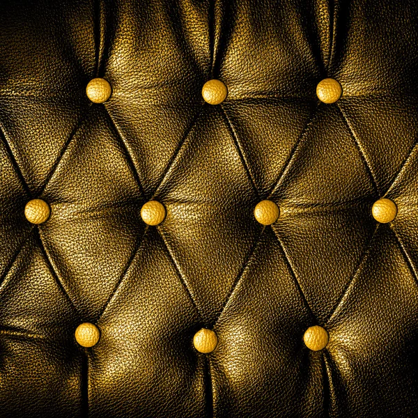 Abstracto Cuadrado de cuero dorado contra fondo de puntos — Foto de Stock