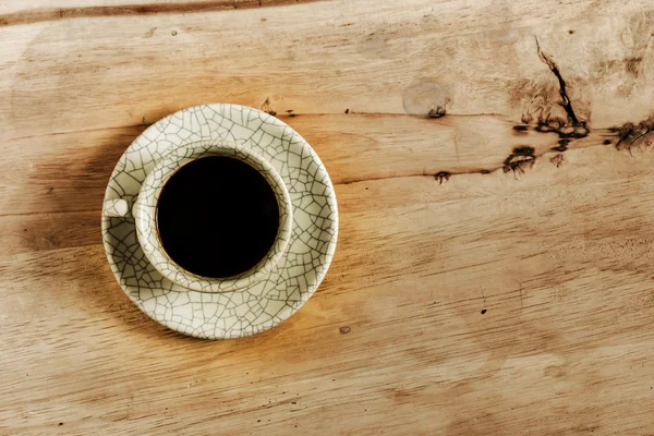 Xícara de café na mesa de madeira com espaço de cópia . — Fotografia de Stock