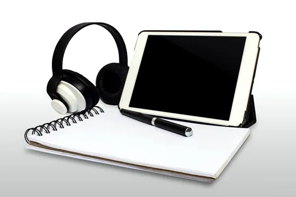 White tablet computer,paper,pen and headphone isolated. — Stock Photo, Image