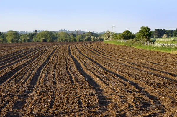 Terres agricoles ciel ciel jachère labouré champ — Photo