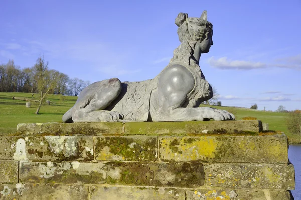 Mythic sculpture in park — Stock Photo, Image