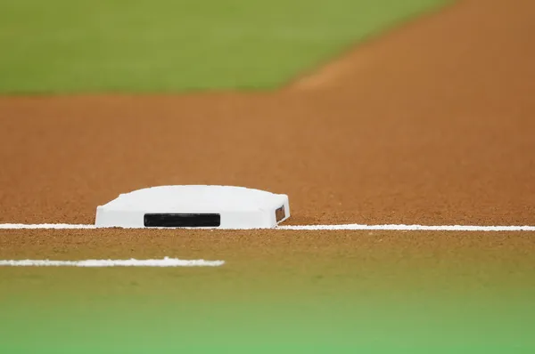 Base at baseball field — Stock Photo, Image