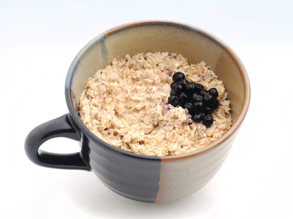 Blueberries and oatmeal — Stock Photo, Image