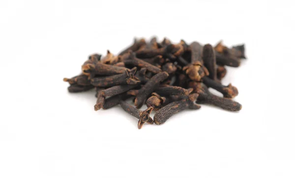 Cloves on white — Stock Photo, Image