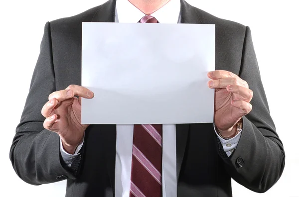 Businessman holding a blank sheet of paper — Stock Photo, Image