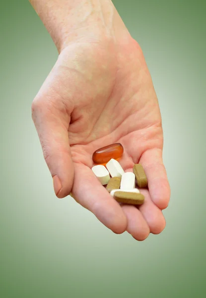 Taking daily vitamins or supplements — Stock Photo, Image