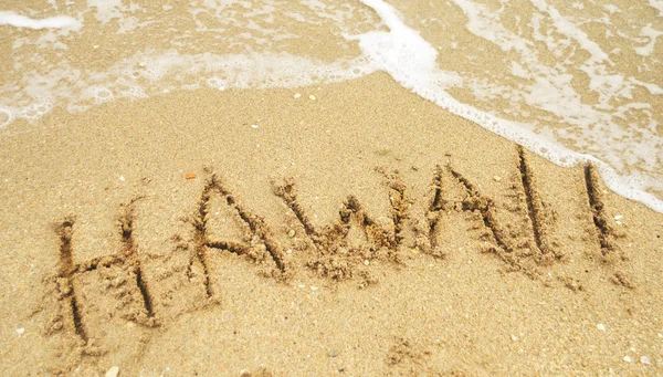 砂に書かれたハワイでの休暇 — ストック写真