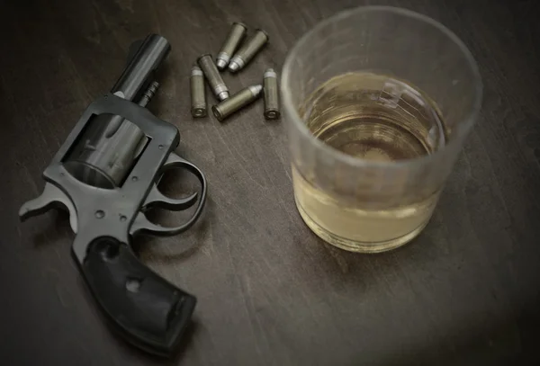 Booze, gun and bullet — Stock Photo, Image
