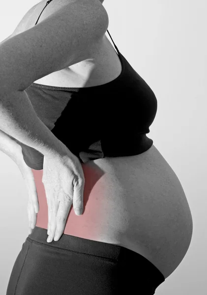 Pregnant woman and back pain — Stock Photo, Image