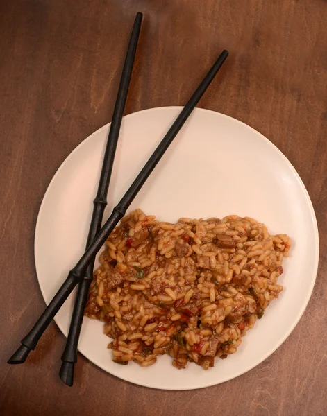 Rice dish with chopsticks — Stock Photo, Image