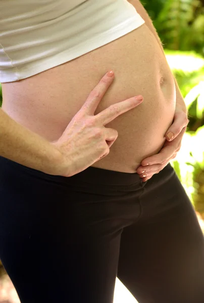 Persika och graviditet — Stockfoto