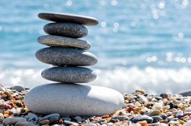 Stone composition on the beach clipart