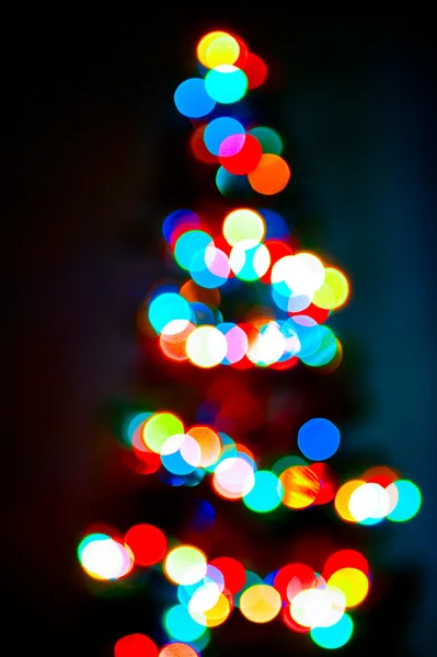 Lichten kerstboom garland in defocus. — Stockfoto