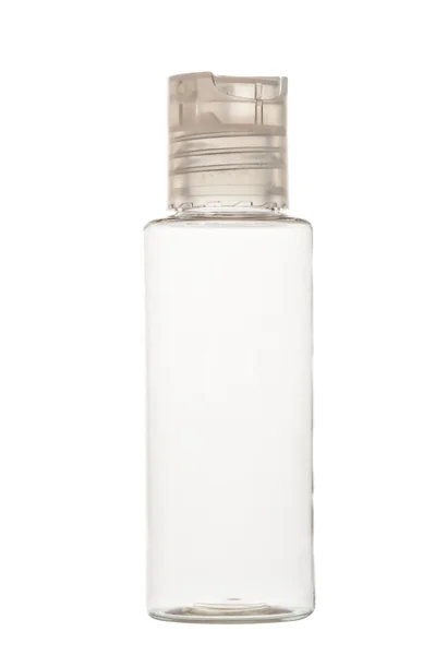 Garrafa de plástico transparente vazia para cosméticos em um fundo branco — Fotografia de Stock