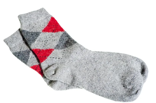 Knitted warm winter socks on a white background — Stock Photo, Image