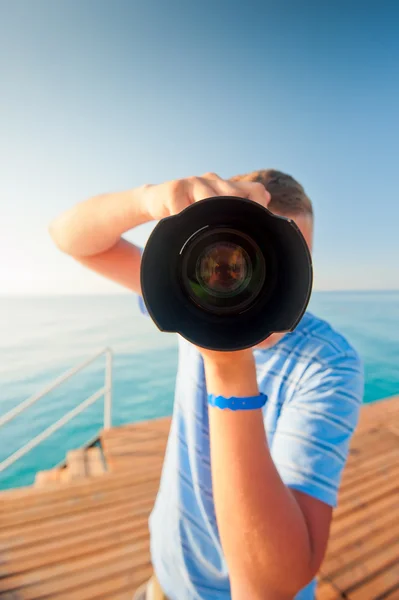 Beach photographer with a large camera closeup — Stock Photo, Image