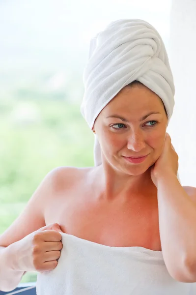 Girl with smile in white towel — Stock Photo, Image