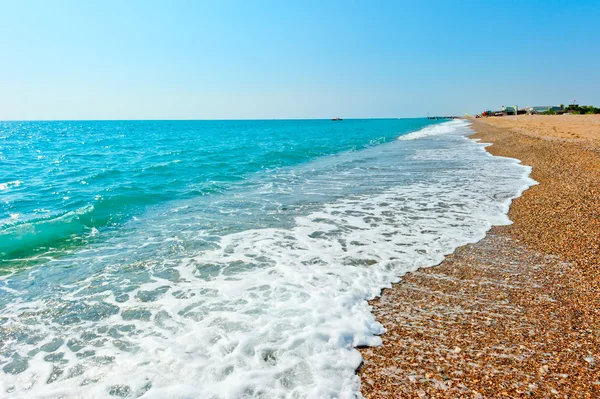 Schuim aqua en zanderige strand — Stockfoto