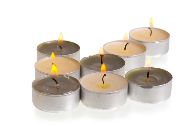 Quadro conceitual, velas alinhadas em uma seta — Fotografia de Stock