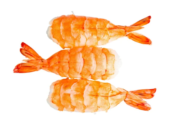 Tres camarones de sushi y arroz sobre un fondo blanco —  Fotos de Stock