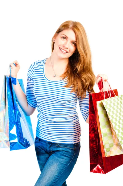Beautiful woman enjoys shopping, studio shot — Stock Photo, Image