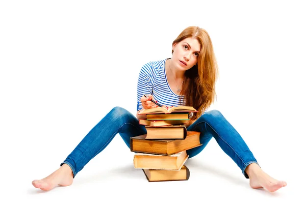 Frustrated student and lots of books — Stock Photo, Image