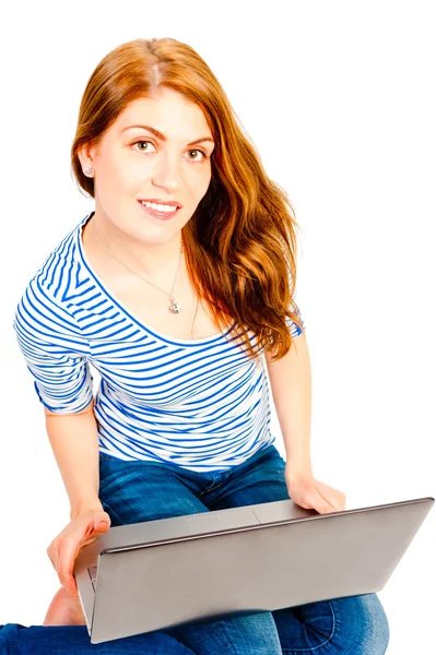 Young attractive woman working at a computer — Stock Photo, Image