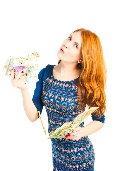 Beautiful young woman holding money in both hands — Stock Photo, Image