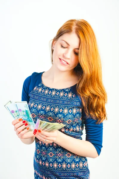 Gelukkig en rijke vrouw op een witte achtergrond — Stockfoto