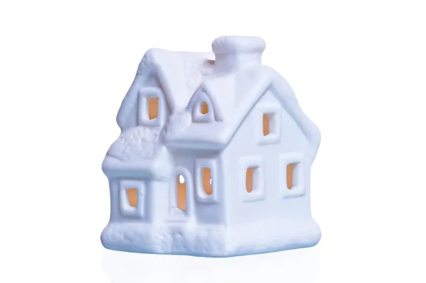 White ceramic souvenir house with glowing windows — Stock Photo, Image