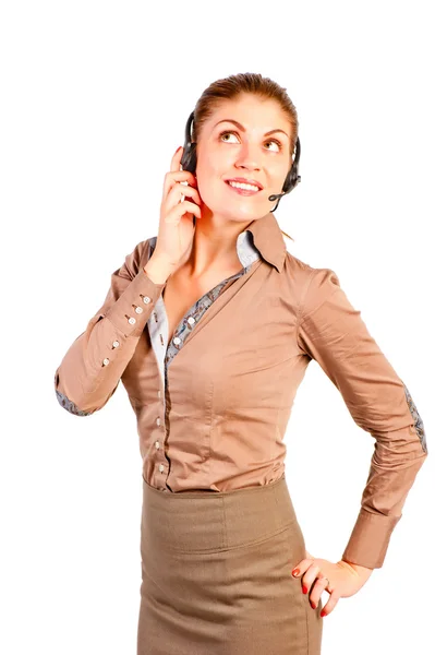 Young beautiful consultant with headset on white background — Stock Photo, Image