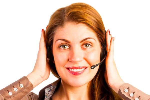 Femme opérateur avec casque redresse ses cheveux — Photo