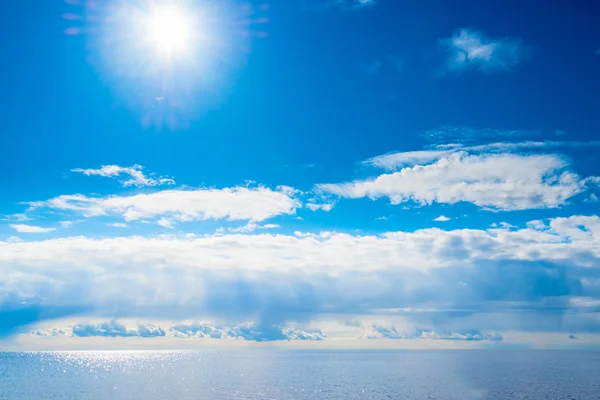 Bright sun and blue sea — Stock Photo, Image