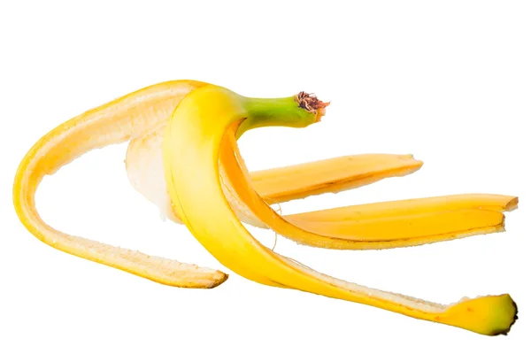 Piel de plátano sobre un fondo blanco de cerca — Foto de Stock