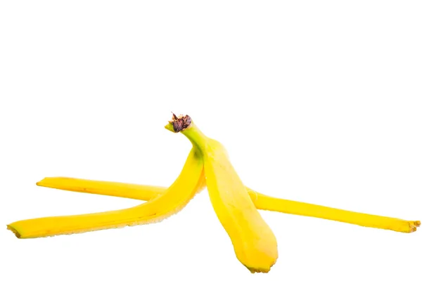 Pele vazia de uma banana no fundo branco — Fotografia de Stock