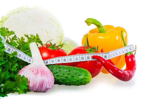 Centimeter and healthy food on a white background Royalty Free Stock Photos