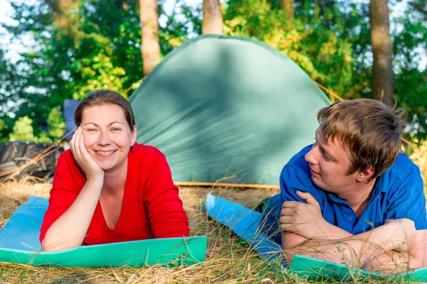 Beautiful people campers with a tent on the nature — Stock Photo, Image