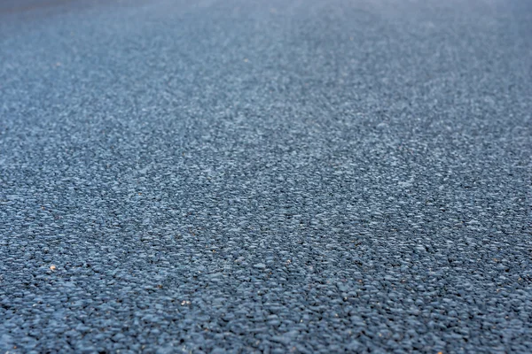 Primer plano de asfalto. Nuevo camino vacío — Foto de Stock