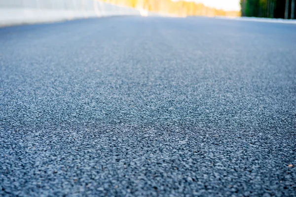 Tiro de asfalto fresco temprano en la mañana — Foto de Stock