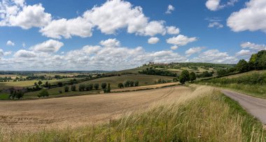 Fields in the area of Chateauneuf with castle on a summers day, burgundy, France