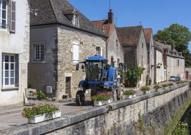 Volnay, France - June 30, 2020: Machine used on the vineyards in burgundy in picturesque village, France.