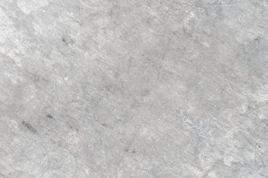 Grunge kirli gri çatlamış beton duvar, beton kirli kağıt, eski parşömen arka planı. Yapılandırılmış beton arkaplan ürün veya tanıtım tasarımı için ücretsiz kopyalama alanı içeriyordu 