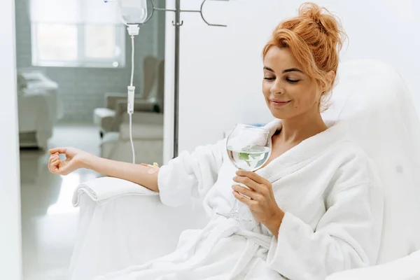 Waist Portrait View Charming Woman White Bathrobe Sitting Armchair Receiving — Stock Photo, Image