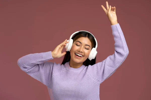 Crazy Asian Woman Headphones Singing Rejoicing Showing Peace Gesture Isolated — Stock Photo, Image