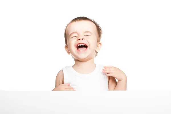 Lindo bebé niño sosteniendo vacío tablero en blanco — Foto de Stock