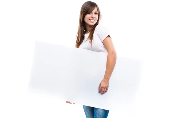 Portrait d'une jeune femme avec panneau d'affichage vierge — Photo