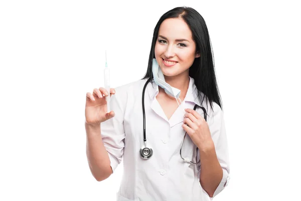 Женщина-врач со шприцем — стоковое фото