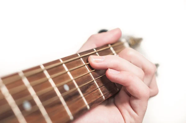 Close up of guitarist hand playing acoustic guitar — Stock Photo, Image